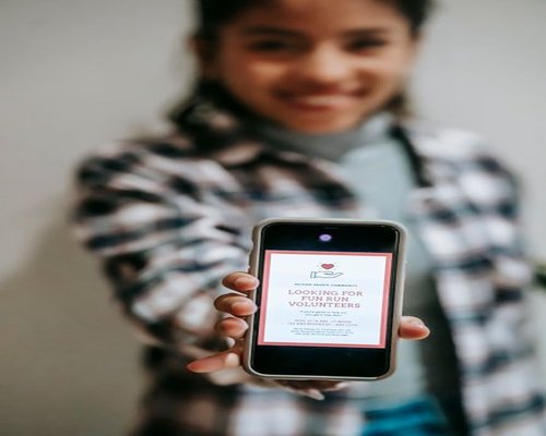 Smartphone with a fictional beginner-friendly game demonstration screen displayed vertically