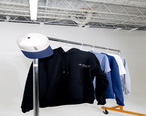 Odyssey Weekend Hoodie presented on hanger
